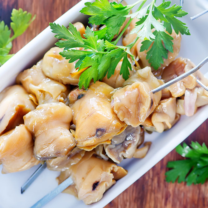 Sandwich de pan francés con pulpa de caracol